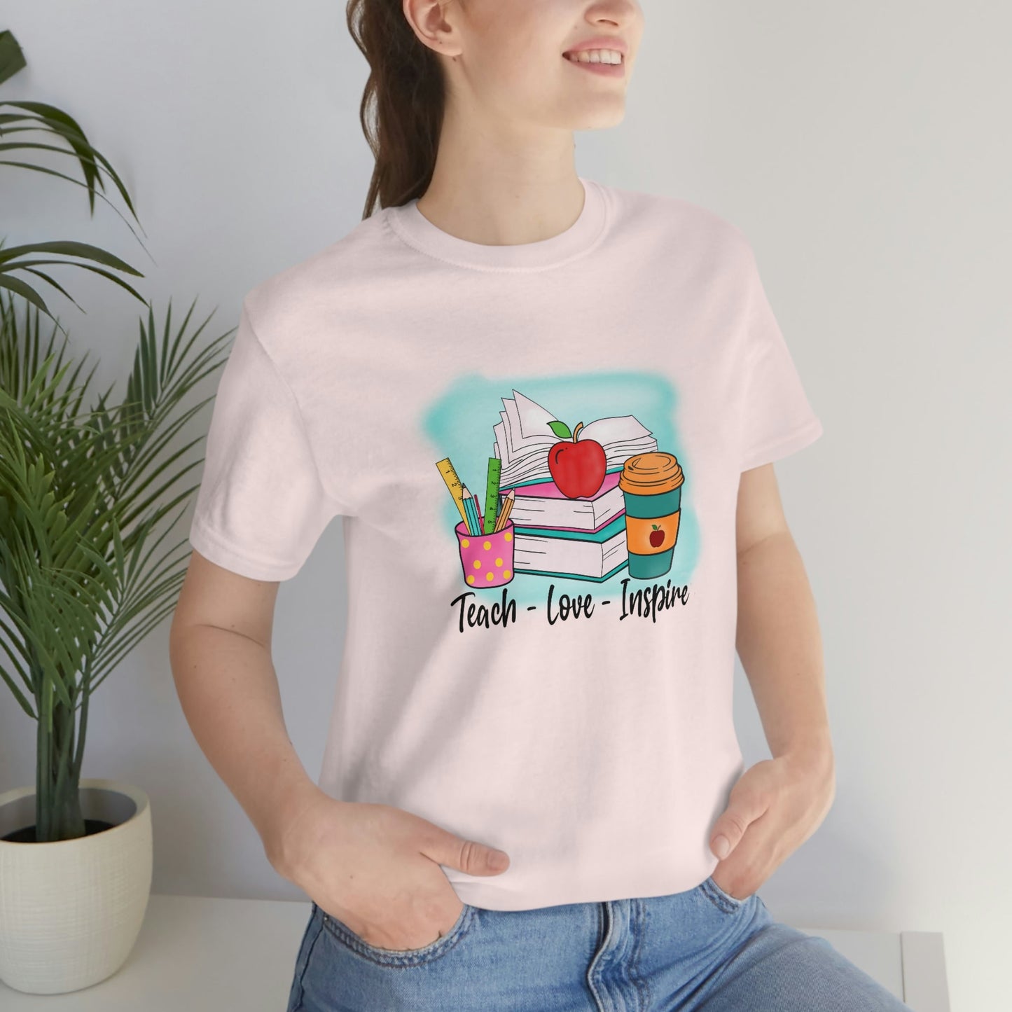 Teach Love Inspire Unisex Jersey Short Sleeve Tee